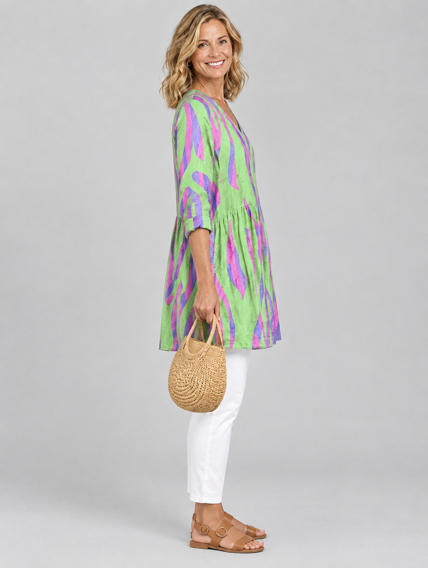 Lyla long blouse in lime green wave print, side view showing the relaxed fit