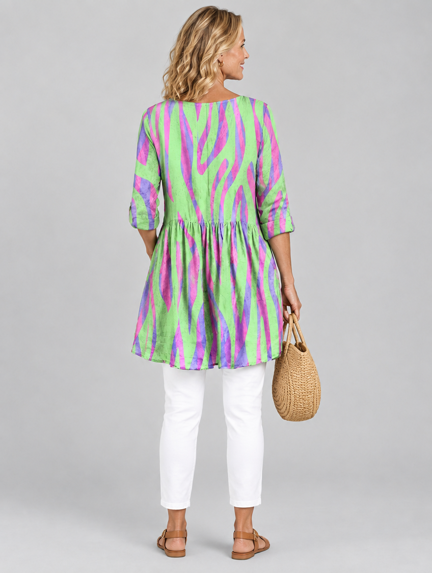 Lyla long blouse in lime green wave print, back view