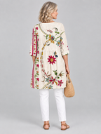 Lottie long blouse in beige folk floral print, back view