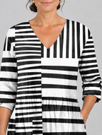 Sienna long blouse in black and white block stripe print, close up of print and neckline