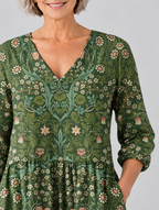 Cecelia long blouse in forest green botanical print, close up of print and neckline
