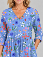 Josie long blouse in periwinkle garden print, close up of print and neckline