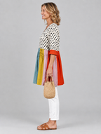 Jacqueline long blouse in polka dot colour block, side view showing the relaxed fit