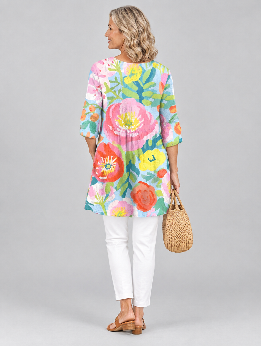 Valerie long blouse in pastel watercolour poppy print on sky blue, back view