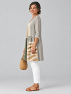 Natalie long blouse in earthy patchwork colour block print, side view showing the relaxed fit