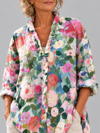 Londyn relaxed tunic in painterly camellia and rose print, close up of print and ruffle collar