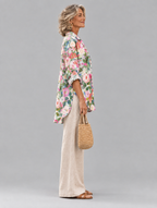 Londyn relaxed tunic in painterly camellia and rose print, side view showing the relaxed fit
