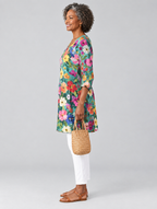 Angel long blouse in teal wildflower print, side view showing the relaxed fit