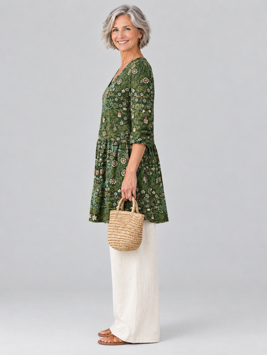Cecelia long blouse in forest green botanical print, side view showing the relaxed fit