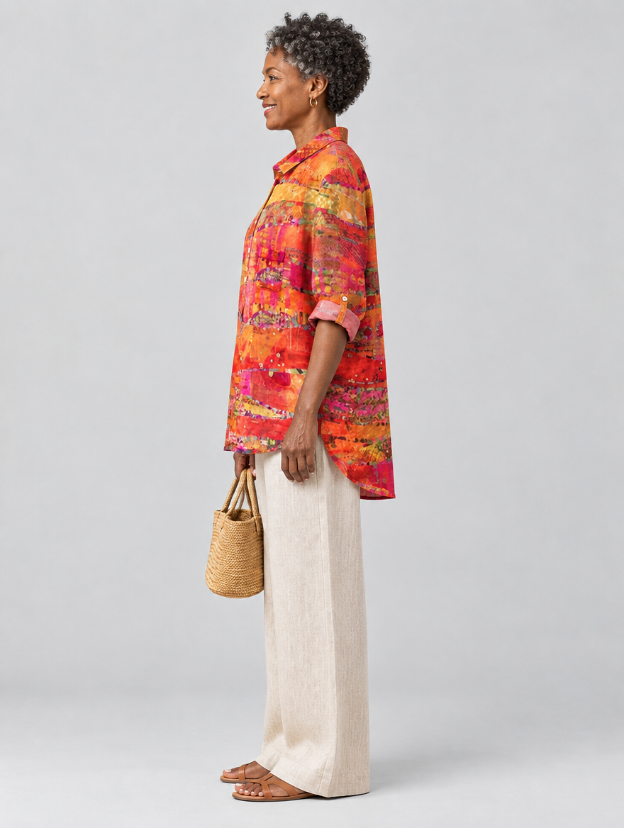 Maureen relaxed tunic in sunset collage print, side view showing the relaxed fit
