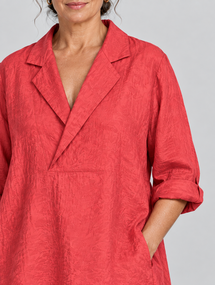 Coleen relaxed tunic in coral red, close up of lapel collar and neckline