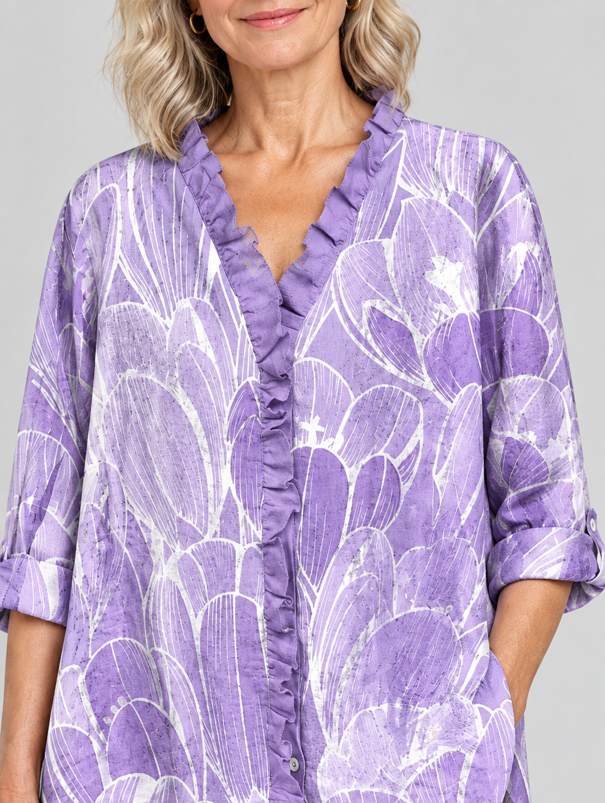 Emmy relaxed tunic in lavender petal print, close up of print and ruffle neckline
