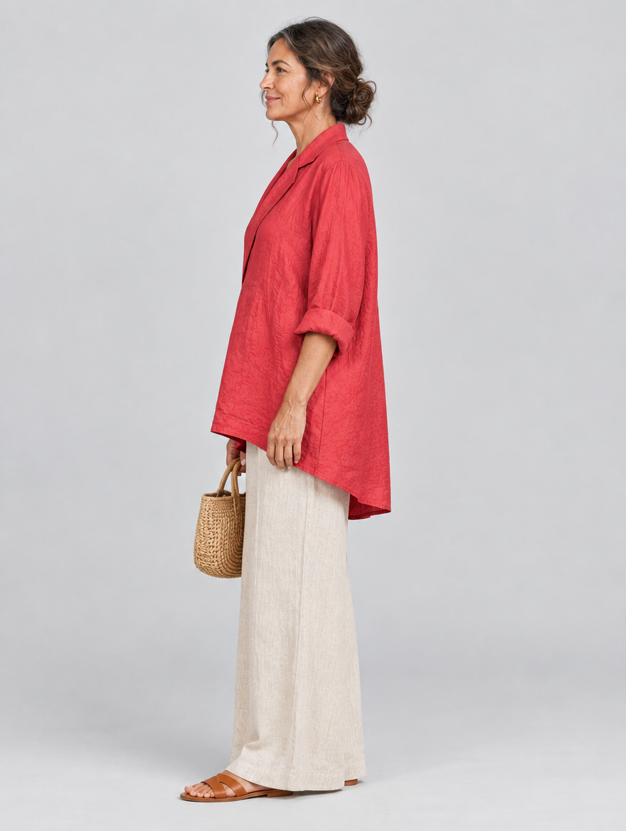 Coleen relaxed tunic in coral red, side view showing the relaxed fit
