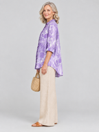 Emmy relaxed tunic in lavender petal print, side view showing the relaxed fit