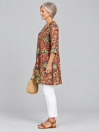 Amoura long blouse in brick red medallion tapestry print, side view showing the relaxed fit
