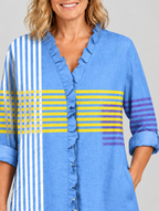 Glenda relaxed tunic in cornflower blue with yellow and violet stripes, close up of print and ruffle neckline