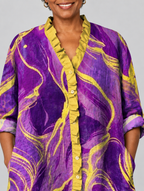 Dorothy relaxed tunic in violet and gold marble print, close up of print and ruffle neckline