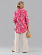 Flora relaxed tunic in raspberry pink rose print, back view