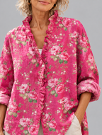 Flora relaxed tunic in raspberry pink rose print, close up of print and ruffle collar