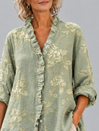 Mabel relaxed tunic in sage green tonal peony print, close up of print and ruffle collar
