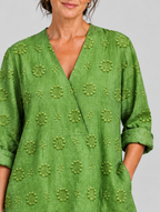 Deborah relaxed tunic in apple green, close up of textured flower pattern and neckline