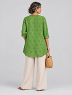 Deborah relaxed tunic in apple green, back view