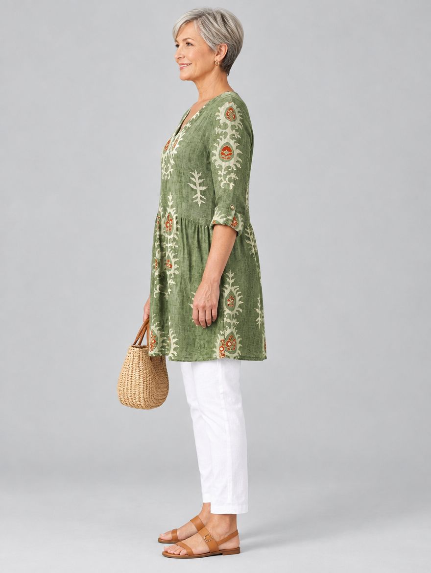 Everly long blouse in sage green botanical print, side view showing the relaxed fit
