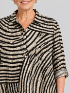 Sharon relaxed tunic in sand and black swirl print, close up of print and collar