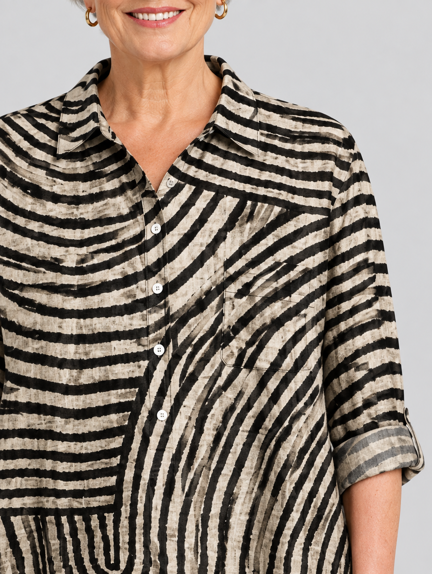 Sharon relaxed tunic in sand and black swirl print, close up of print and collar