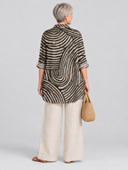 Sharon relaxed tunic in sand and black swirl print, back view