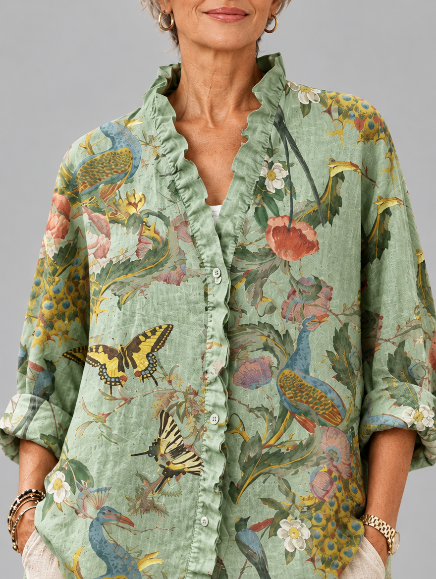 Patricia relaxed tunic in sage peacock and poppy print, close up of print and ruffle collar
