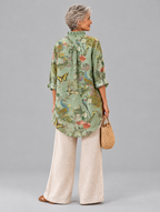 Patricia relaxed tunic in sage peacock and poppy print, back view