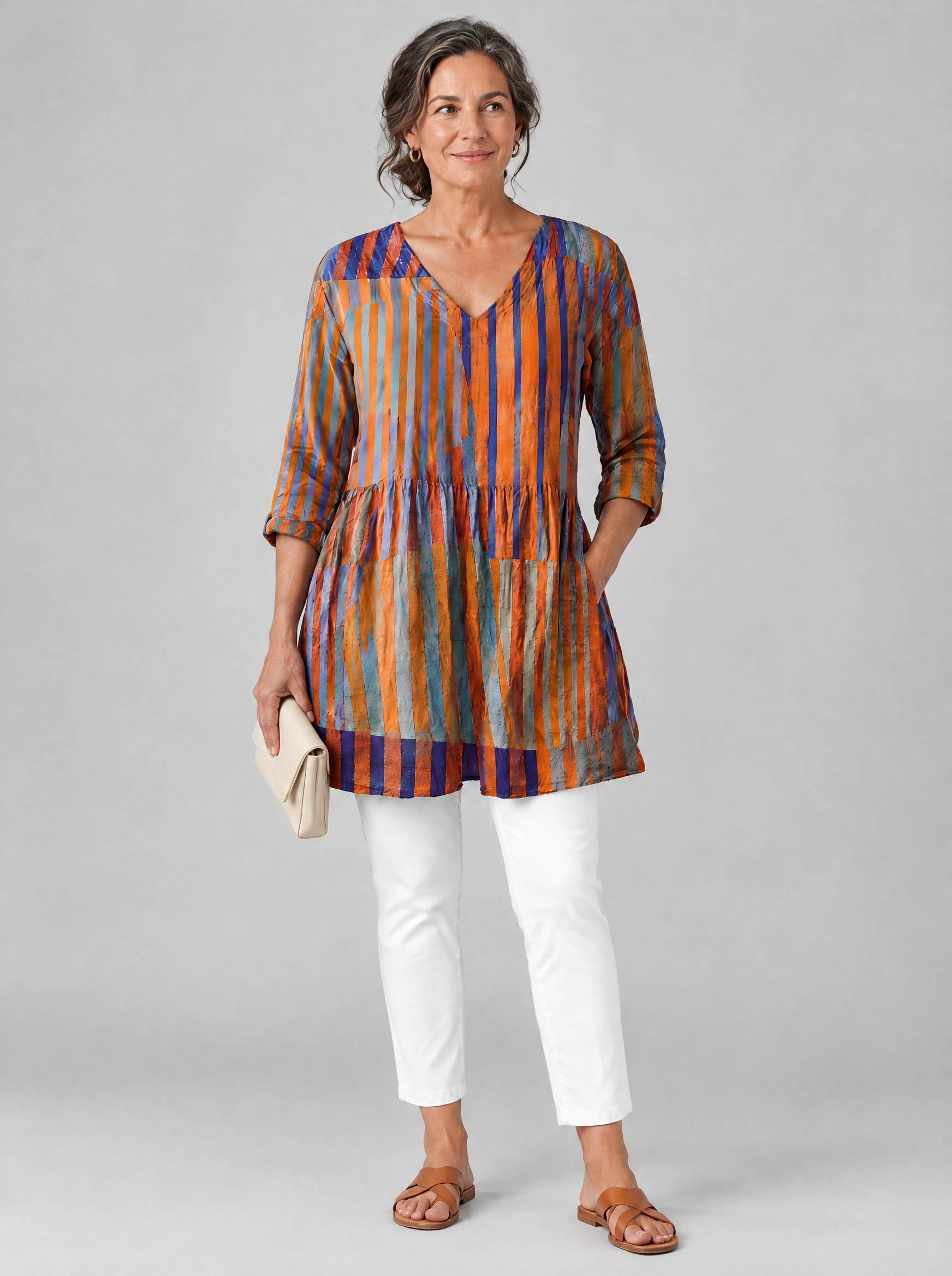 Amaia long blouse in burnt orange and violet painted stripe print, front view