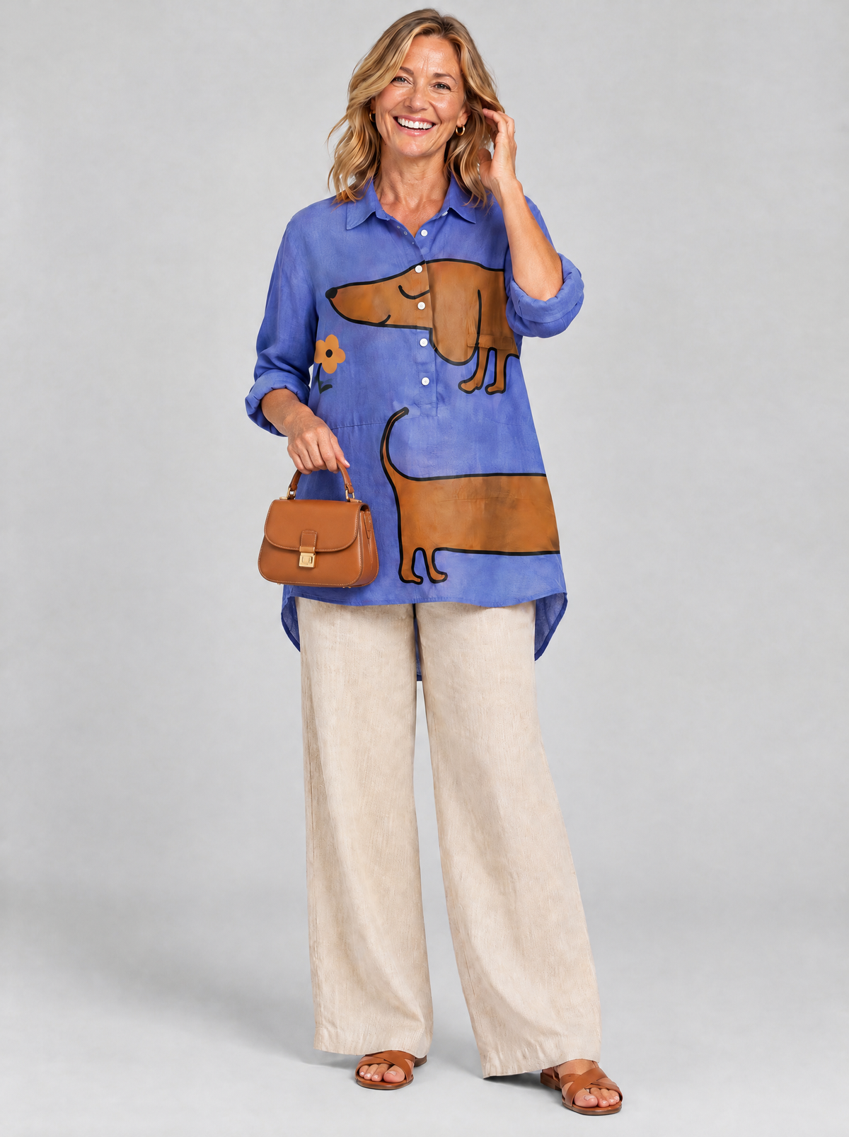 Anne relaxed tunic in periwinkle blue sausage dog print, front view