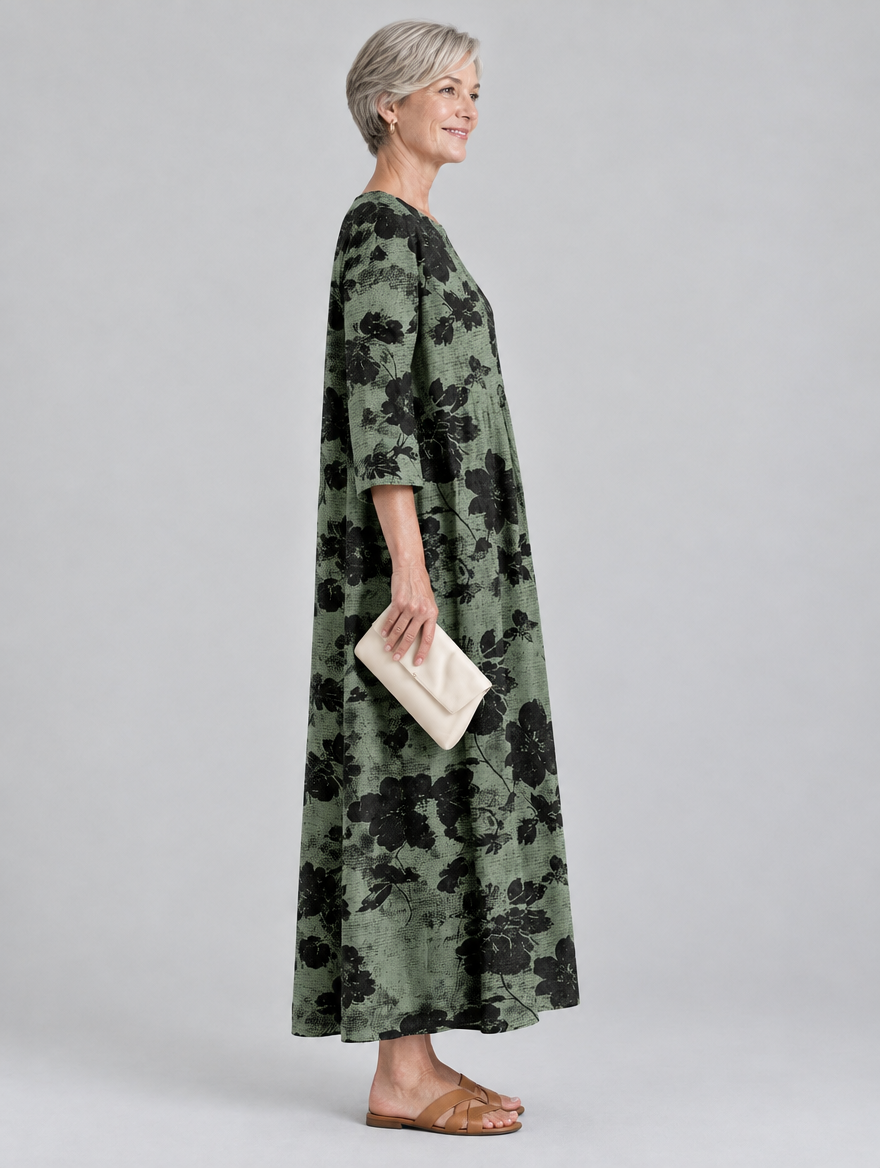 Scarlett printed maxi dress in sage green with black floral print, side view