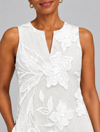 Camila sleeveless maxi dress in white with tonal floral print, close up of print and neckline