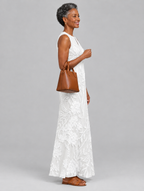 Camila sleeveless maxi dress in white with tonal floral print, side view