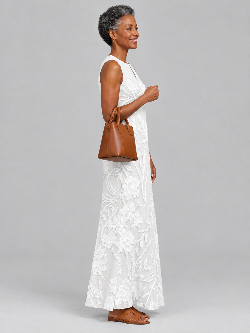 Camila sleeveless maxi dress in white with tonal floral print, side view