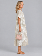 Aurora midi dress in khaki with soft white floral print, side view