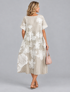 Aurora midi dress in khaki with soft white floral print, back view