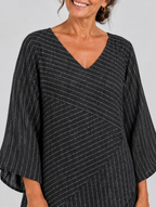 Ella pinstripe tunic top in black, close up of print and neckline