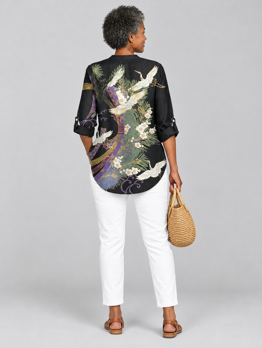Penelope printed shirt in black with crane and blossom print, back view