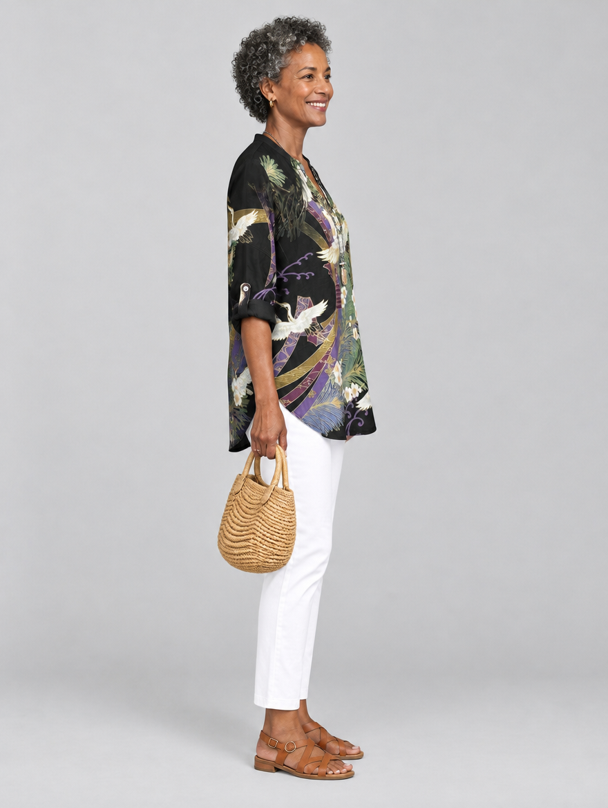 Penelope printed shirt in black with crane and blossom print, side view