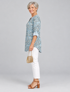 Aria printed tunic top in light blue with embossed rose print, side view