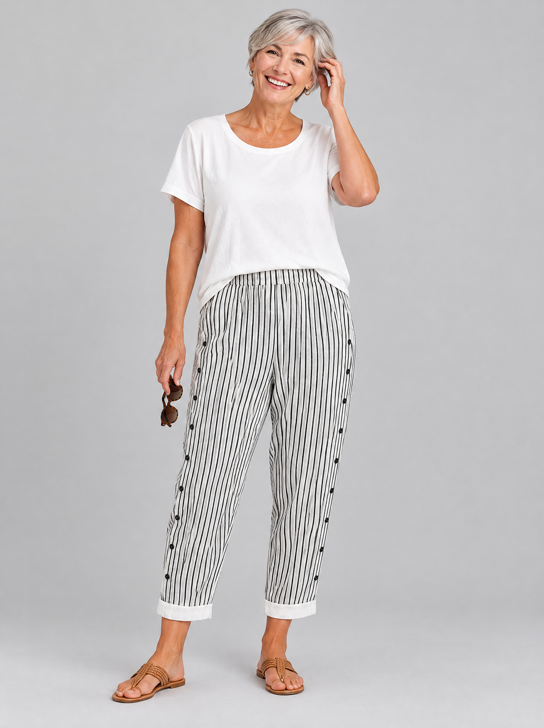 Megan button trousers in white with black pinstripes, front view