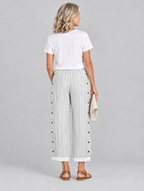 Inaya button trousers in white stripe, back view