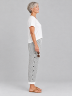 Megan button trousers in black pinstripe, side view