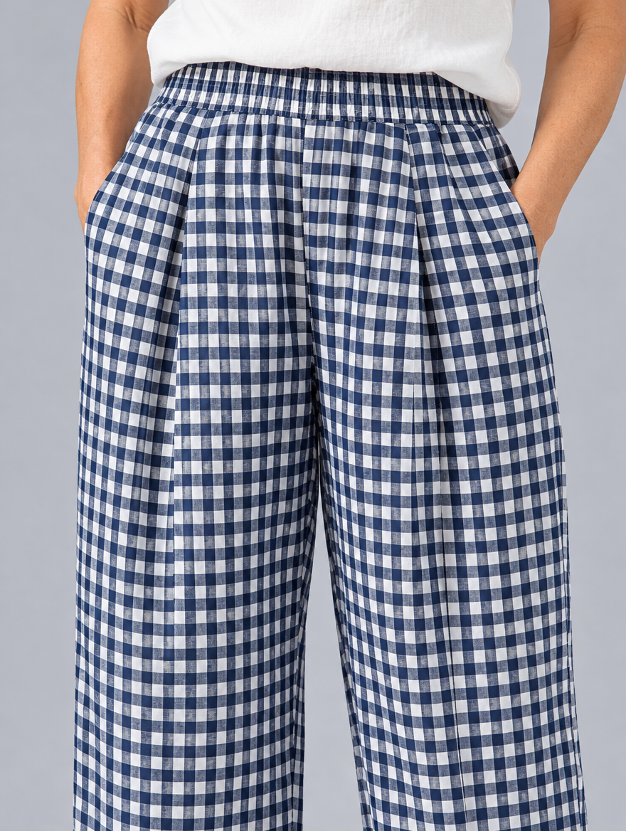 Chelsea gingham trousers in navy check, close up of elastic waistband, pleats and fabric