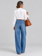 Amani vintage high waisted jeans in mid blue, back view