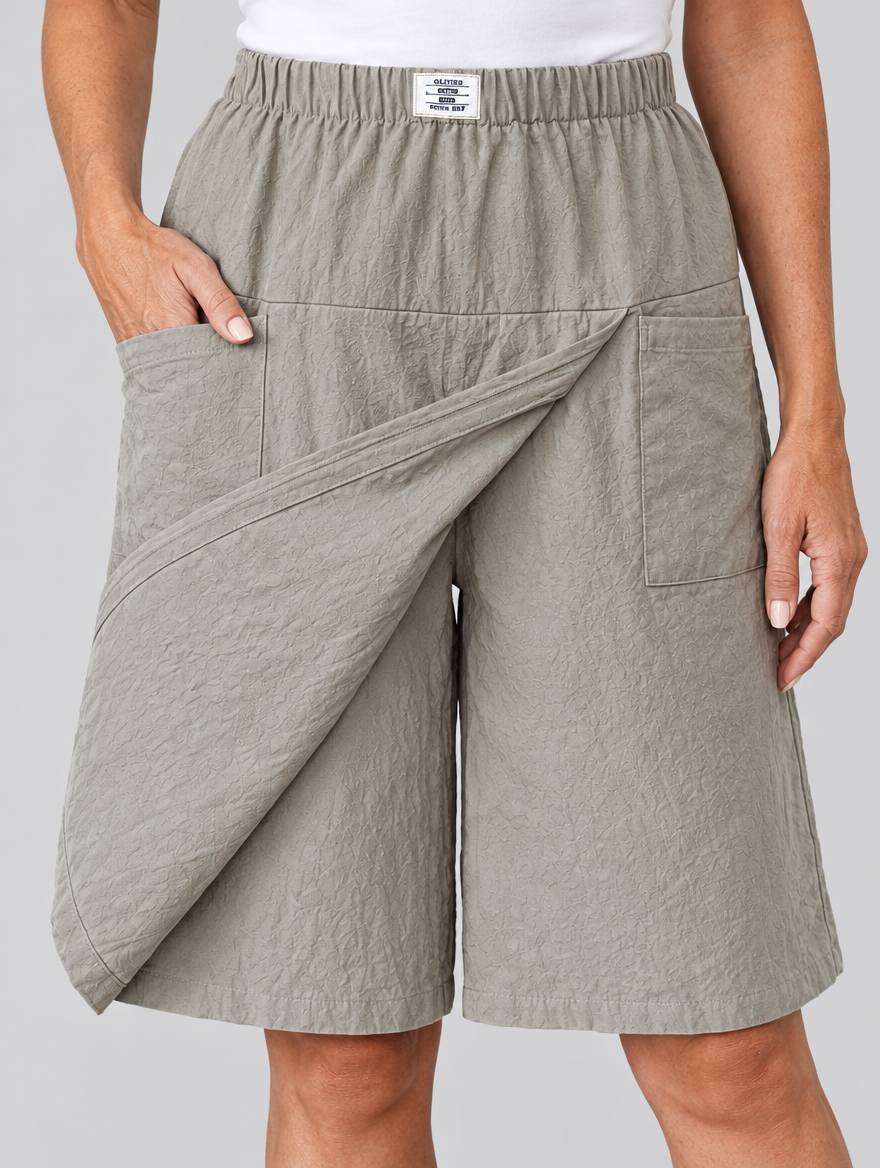 Saskia skort shorts in light grey, close up of waistband, wrap panel and pockets